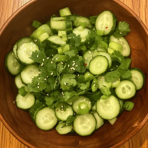 Asian cuisine has gained immense popularity worldwide, celebrated for its vibrant flavors, fresh ingredients, and healthful qualities. One dish that exemplifies these traits is the Crunchy Bliss: Easy Asian Cucumber Salad. This salad is a delightful combination of textures and tastes, featuring the refreshing crunch of cucumbers, the tanginess of rice vinegar, and a hint of umami from soy sauce. It’s a perfect accompaniment to any meal, a light starter, or even a stand-alone dish that shines on its own.