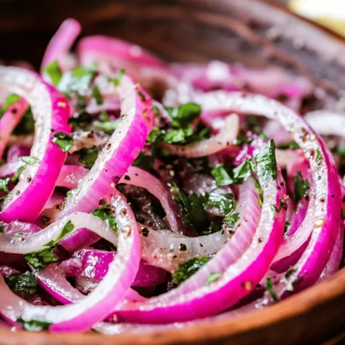 Zesty Sumac Onions is a vibrant dish that brings a burst of flavor and brightness to any table. Rooted in Middle Eastern cuisine, this dish exemplifies how simple ingredients can create unparalleled taste experiences. The use of sumac, a tangy spice made from the dried berries of the sumac plant, elevates the humble onion to new heights. This recipe not only showcases the unique characteristics of sumac but also emphasizes the importance of incorporating fresh ingredients into our everyday meals. As more people seek to explore diverse flavors and healthy cooking options, Zesty Sumac Onions stands out as a fresh and zesty addition to any culinary repertoire.