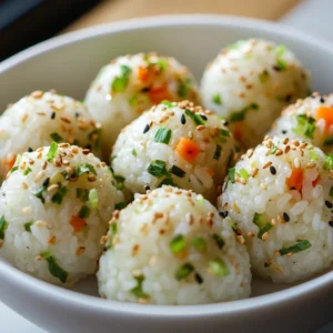 The demands of a busy school day can often leave parents searching for quick yet nutritious meal options. Korean rice balls, known as "jumeok-bap," offer a flavorful solution packed with wholesome ingredients. These delightful bites can be prepped in just 15 minutes, making them perfect for back-to-school lunch ideas. Their versatility allows for customization based on personal preferences, ensuring that every bite is satisfying.