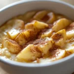 The Protein-Packed Apple Cinnamon Cottage Cheese Bake offers a delightful mix of flavor and nutrition, making it an excellent choice for breakfast, snacks, or desserts. This recipe marries the creamy richness of cottage cheese with the chewiness of rolled oats and the natural sweetness of apples, all harmonized by the warm, aromatic spice of cinnamon. Each bite of this bake is not only satisfying but also provides a substantial dose of protein and fiber, ideal for kickstarting your day or fueling an afternoon slump.