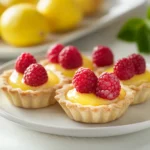 The perfect blend of tangy lemon and sweet raspberries, these Lemon Raspberry Tartlets are a delightful treat that can elevate any gathering. Their individually portioned sizes make them ideal for sharing while still showcasing an elegant presentation. Whether for a summer picnic or a festive dessert table, these tartlets are sure to impress and satisfy. The tartness of the lemon filling perfectly complements the sweetness of the fresh raspberries, creating a harmonious duo that delights the palate. With their eye-catching appearance and vibrant flavors, these tartlets can be the star of your dessert spread.
