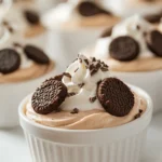 The allure of Cookies & Cream Mousse lies in its perfect balance of creaminess and crunchy texture. This delectable dessert is a crowd-pleaser that brings a hint of nostalgia with its rich flavors reminiscent of childhood treats. The chocolate sandwich cookies lend a delightful crunch that contrasts beautifully with the smooth, velvety mousse, making every bite a delightful experience. The creamy mousse, alongside the subtle sweetness and a hint of vanilla, creates a dessert that is not only satisfying but also indulgent.