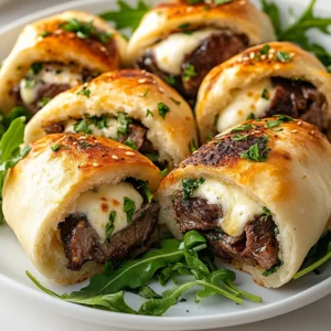 Exploring culinary delights can lead to the creation of dishes that not only satisfy hunger but also deliver exciting flavor combinations. One such dish is Mini Garlic Butter Steak Stuffed Flatbread Rolls. This recipe takes the classic steak and transforms it into a portable, deliciously packed treat that can be enjoyed as an appetizer or a main course. Using fresh herbs, buttery garlic, and high-quality flank steak, these rolls provide a delightful experience for your taste buds.