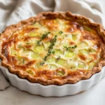 Delve into the delightful world of French cuisine with this Gruyere and Leek Tart. This savory dish encapsulates the essence of elegant French flavors, making it a perfect centerpiece for any meal. As you prepare this creamy and rich tart, you're not just cooking; you're embracing a part of French culinary tradition. The combination of creamy Gruyere cheese and tender leeks enveloped in a flaky pre-made pie crust offers both comfort and sophistication, ideal for a cozy family dinner or an elegant gathering with friends.