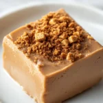 Cookie Butter Fudge Delight is a dessert that marvelously combines the sweet, warm flavors of cookie butter with the creaminess of fudge. This indulgent treat is perfect for satisfying those sweet cravings and adds a delightful twist to traditional fudge recipes. The rich, velvety texture complements the crunch of graham crackers, resulting in a dessert that is both comforting and utterly delicious.