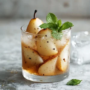 The Caramelized Pear Vanilla Cooler is a delightful blend of sweet, toasted flavors and refreshing notes that create a perfect beverage for warm days or special gatherings. Combining roasted pears with the zest of fresh lemon juice and hydrating coconut water, this recipe offers a unique twist on traditional cooler drinks. Ideal for those seeking an elegant, yet simple, treat, this drink showcases the best of seasonal fruits and natural sweeteners.