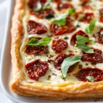 Italian cuisine is renowned for its rich flavors, fresh ingredients, and time-honored traditions. Each dish tells a story, often rooted in family recipes passed down through generations, and this is where the true magic lies. Among the treasures of Italian cooking is the Savory Sun-Dried Tomato Tart, a remarkable dish that epitomizes the essence of Italian fare—simple yet bursting with flavor.