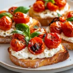 Exploring the vibrant flavors of Italian cuisine can be as delightful as savoring the dish itself. One such appetizer that embodies simplicity and sophistication is Ricotta Bruschetta with Roasted Tomatoes. This delectable combination of creamy ricotta and sweet roasted tomatoes is perfect for any occasion, whether it's a casual family gathering, a festive holiday soiree, or an elegant dinner party. The dish not only captures the essence of Italian flavors but also brings a visual appeal that is sure to impress your guests.